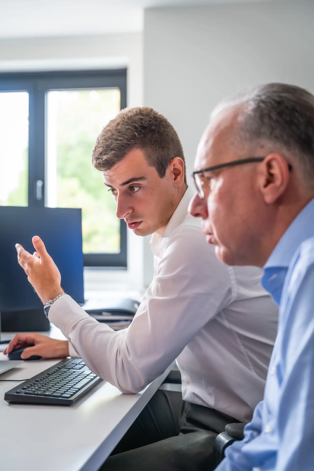 Persoonlijk IT-adviesgesprek bij AT-COM in Herenthout – betrouwbare en klantgerichte ondersteuning voor KMO’s in België.